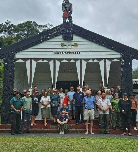 Hui attendees outside Te Rawhiti Marae