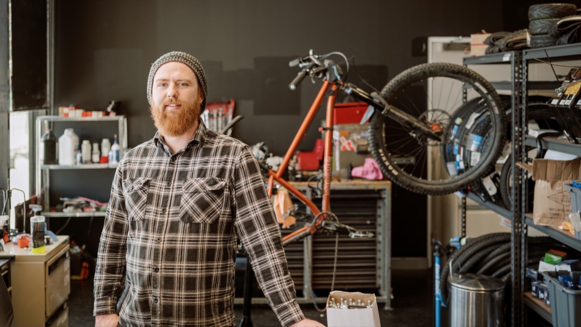 Mojo Cycles' owner Chris in the shop
