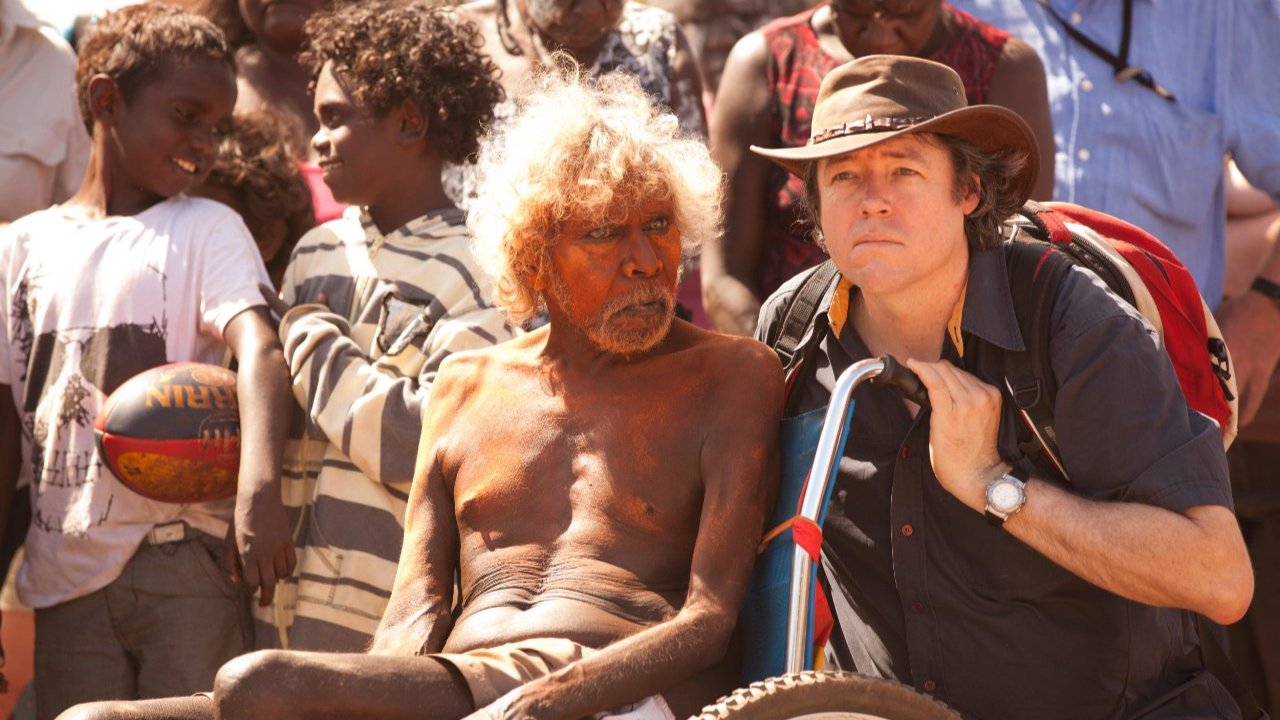 Close-up of two species of spiders amidst leaves building elaborate structures to trick attackers.