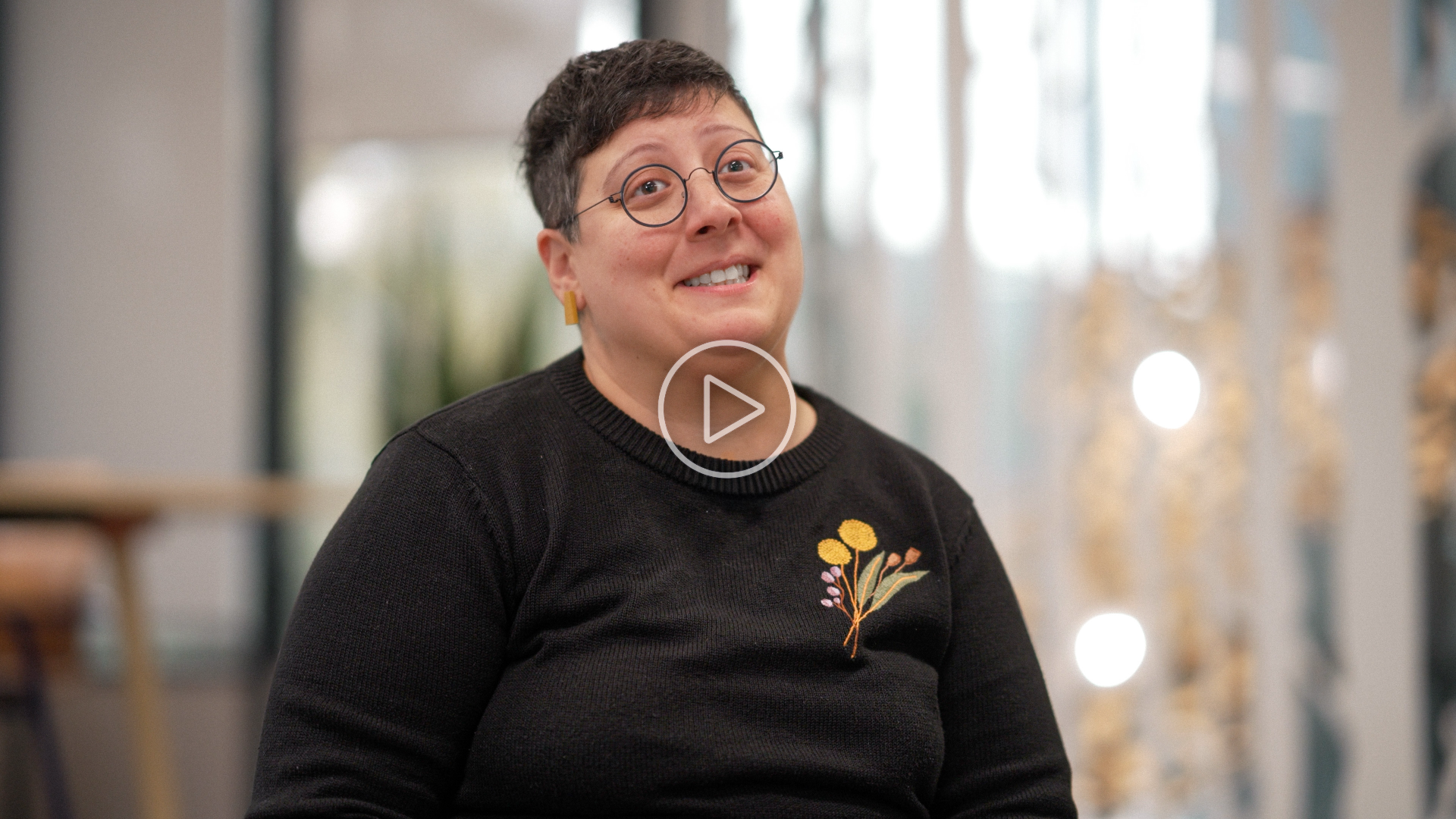 A close-up shot of Dr Lina Koleilat, Academic Fellow in the Residential Experience Division. Smiling and talking to someone off camera.
