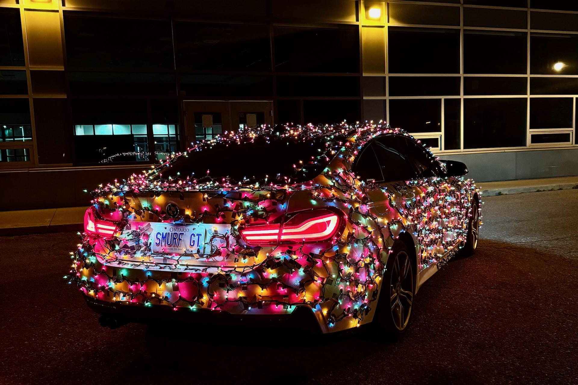 car wrapped in christmas lights