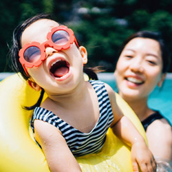 Mother and child playing in the water