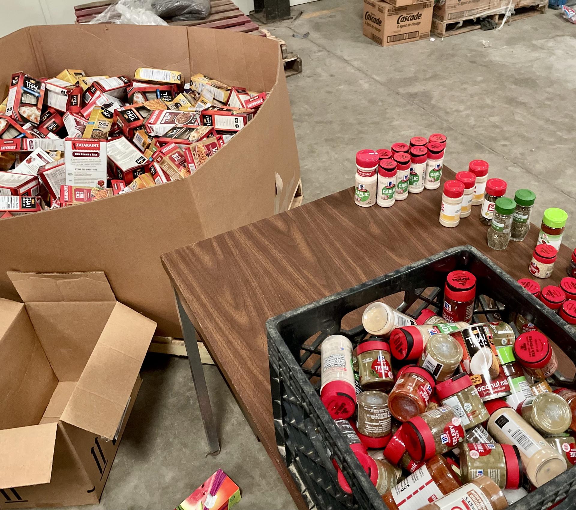 Pallets of donated food being prepared for food pantry client distribution in the Mississippi Delta, USA. Photo by Sophie Hathaway. 