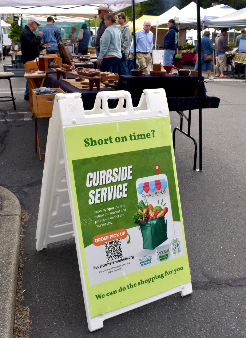 Photo of curbside pickup for online orders at the Santa Rosa (California) Community Farmers Market. Photo provided by the authors.