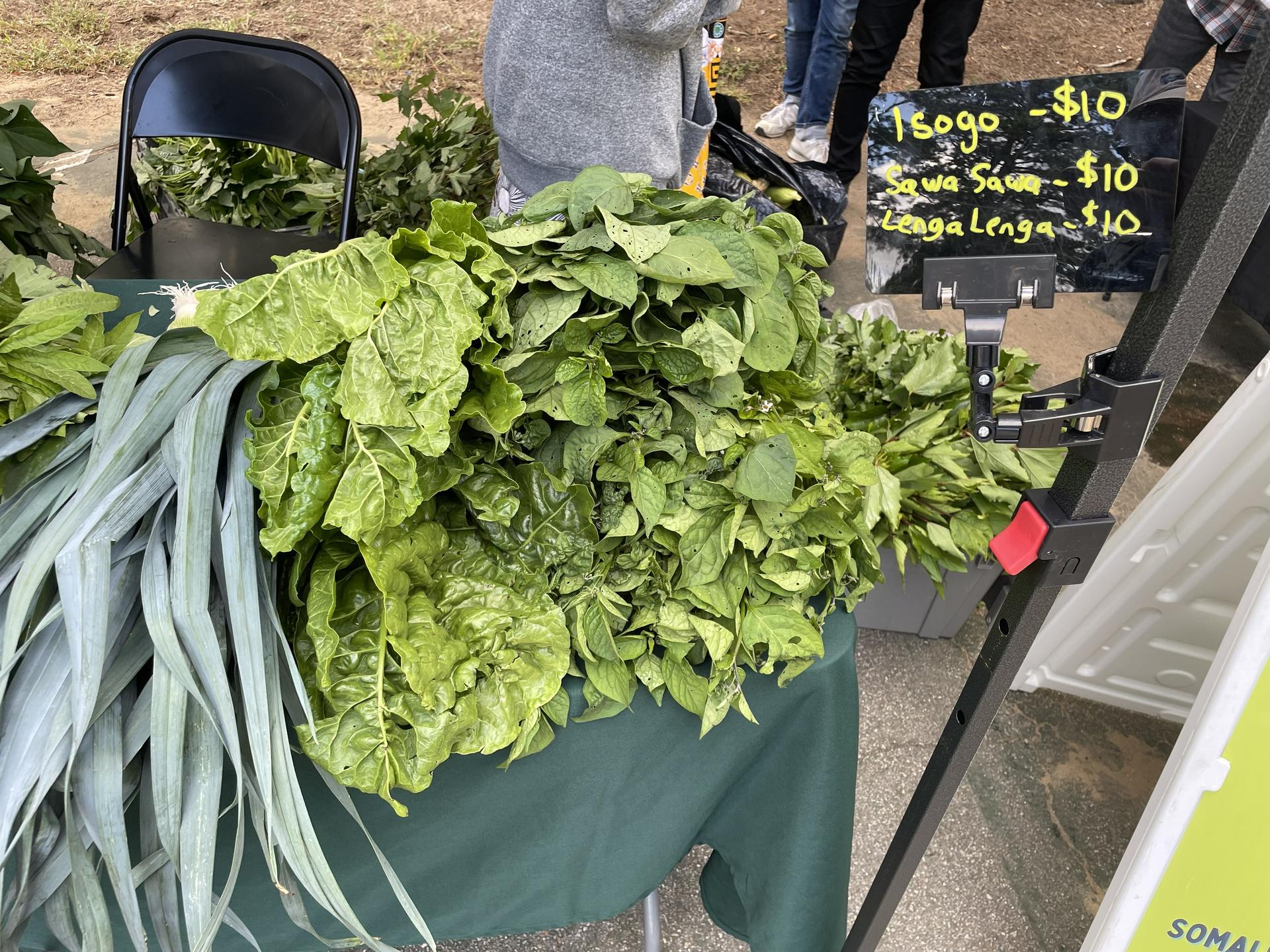 Photo of Lenga Lenga, Isogo, and Sawa Sawa—culturally appropriate vegetables deeply valued in African immigrant communities and integral to their foodways—grown by immigrant and refugee farmers and offered at the Morningstar Farmers’ Market in Concord, New Hampshire, USA
