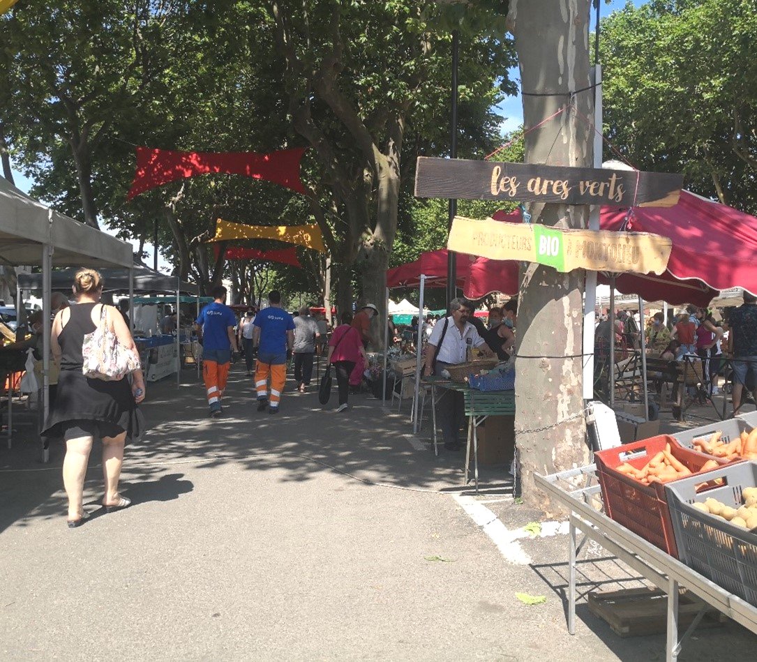 Photo of a farmers market in France. Photo copyright by Tianzhu Liu.