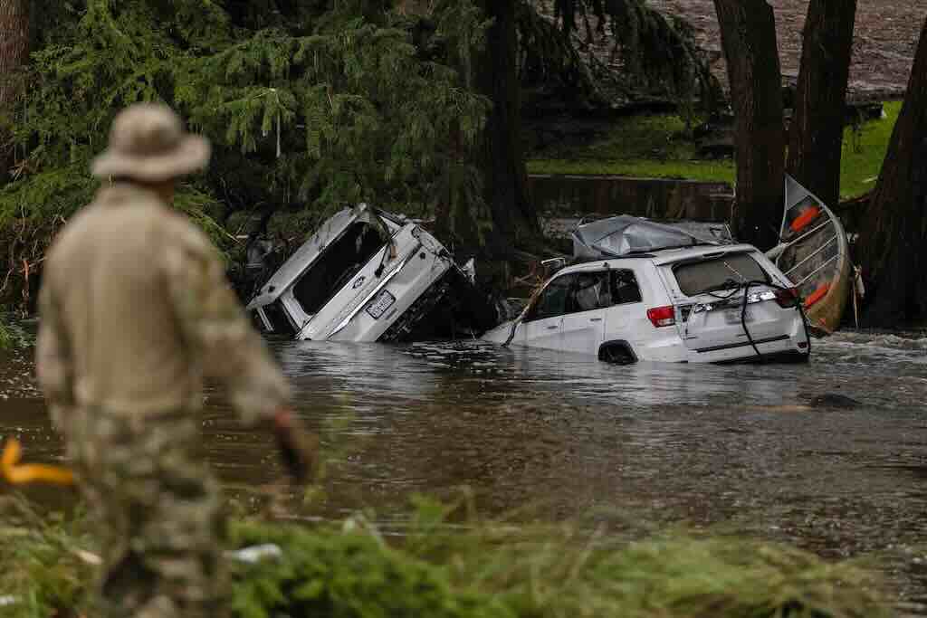 cars piled up in flood waters