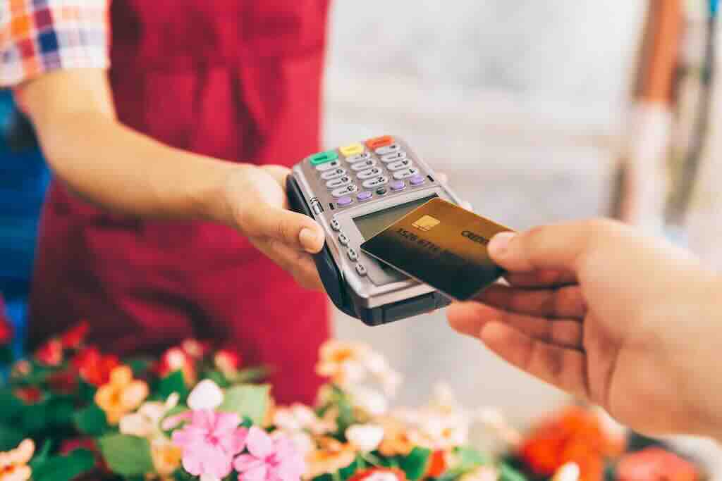 a person paying with a credit card