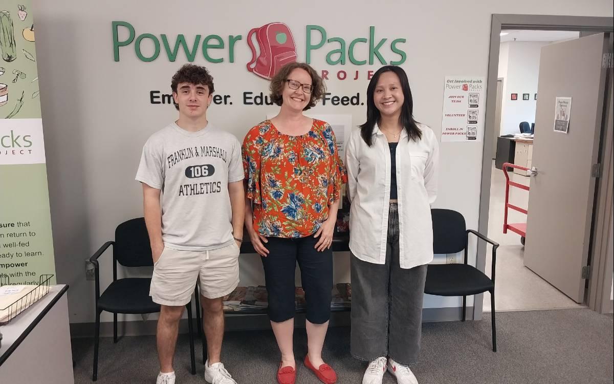 Sergio Marin ’26, Professor Christina Weaver, and Nancy Nguyen ’26