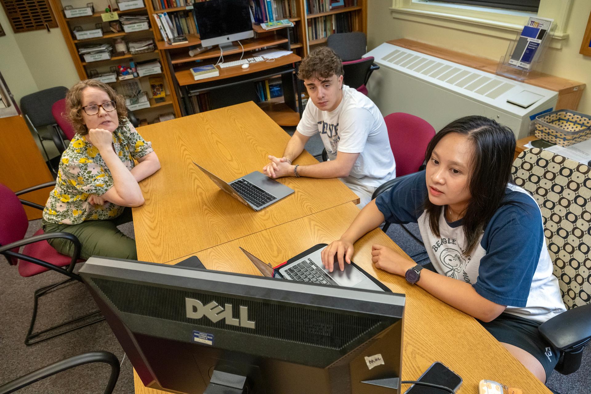 Sergio Marin ’26, Professor Christina Weaver, and Nancy Nguyen ’26