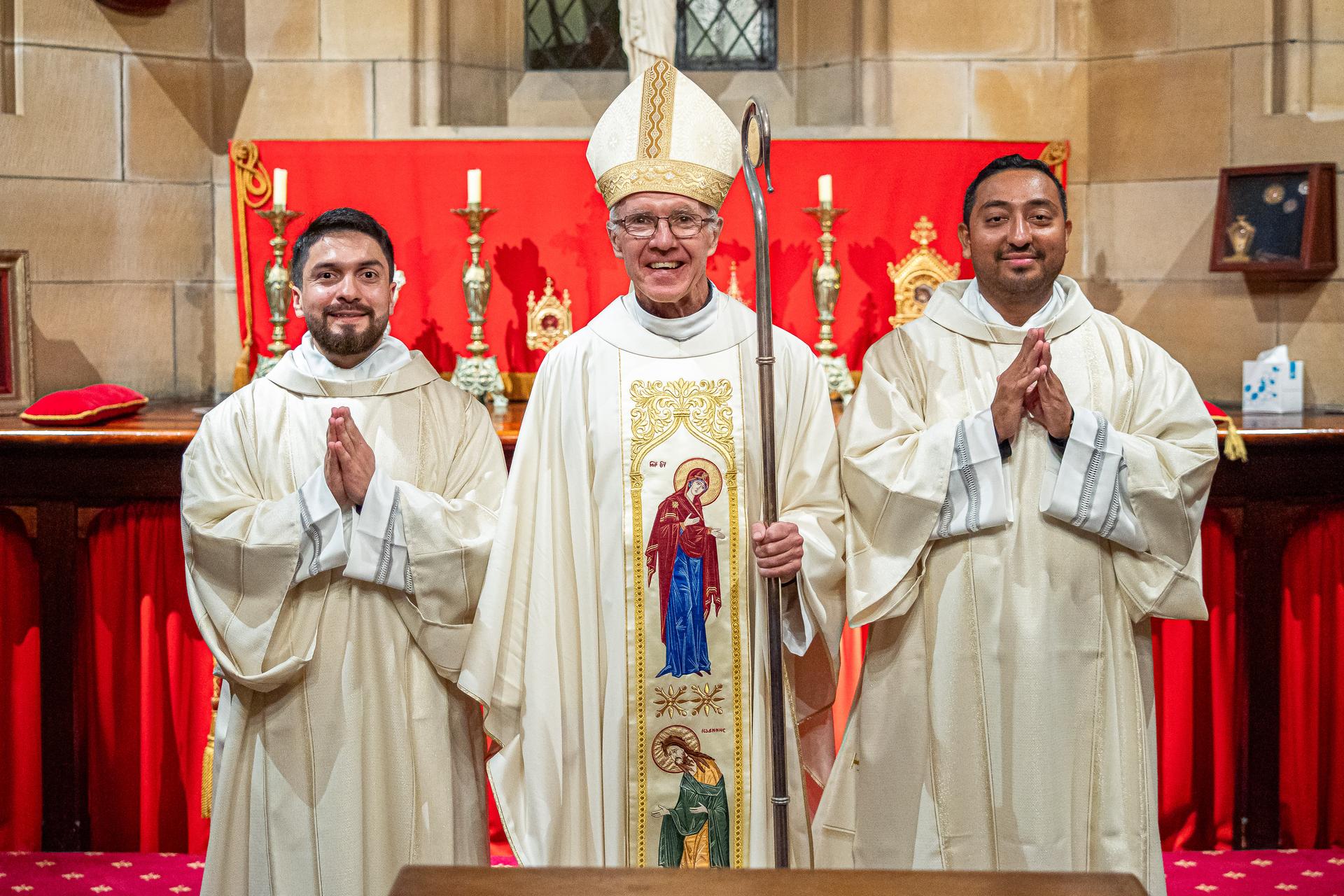 Deacon Giovanni (L) with Bishop Danny Meagher and Deacon Jorge (R)