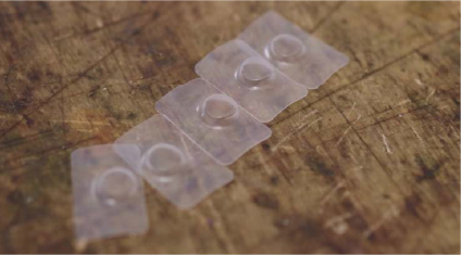 The finished pressureformed sensor cover after postprocessing