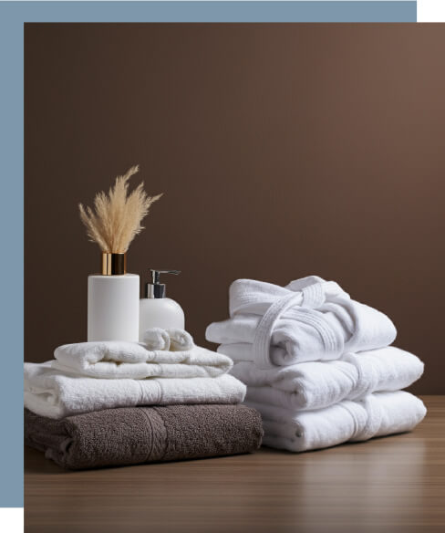 Robe, towels and sheets as part of a package.