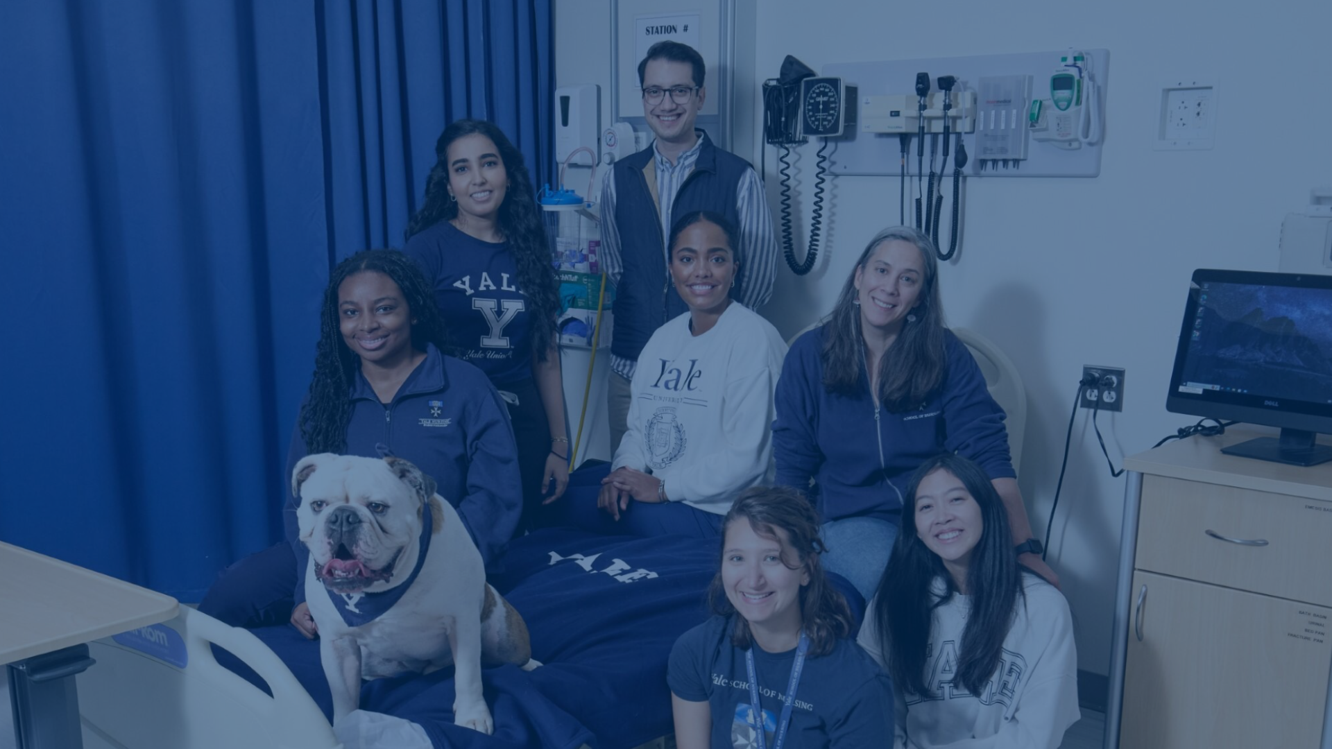 YSN students in a group photo at the simulation lab