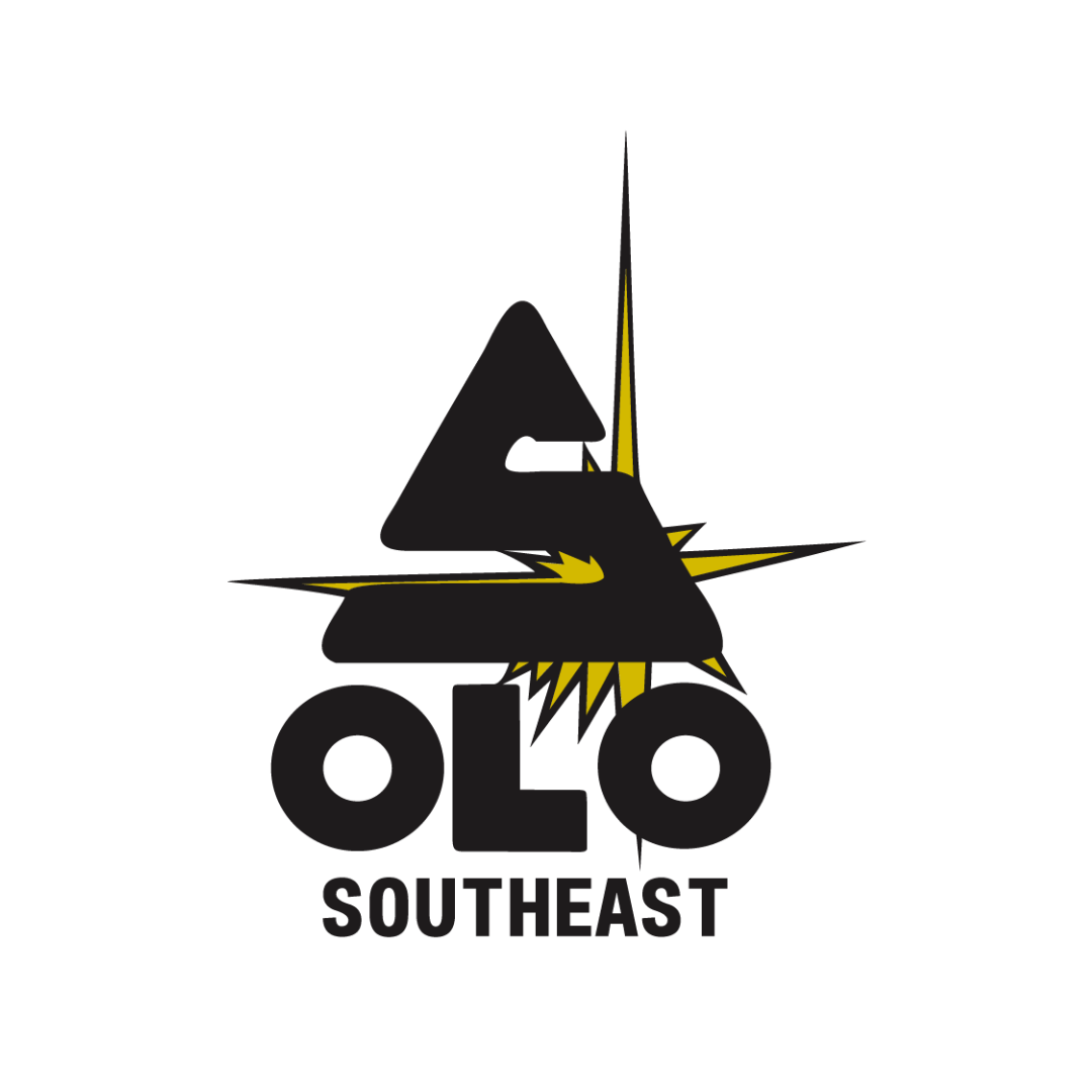 a black and yellow logo