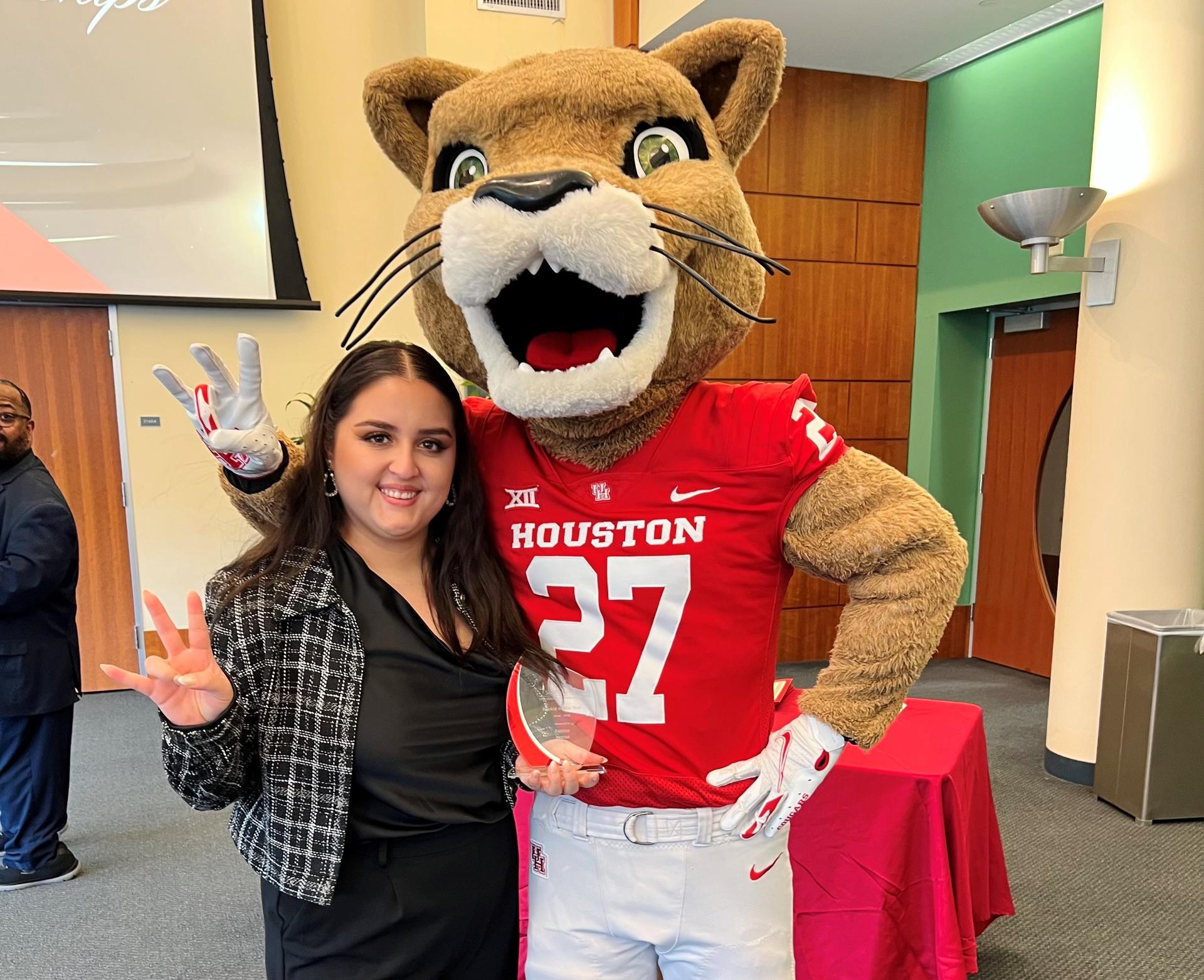 Program Coordinator, Fatima Moran, posing with Shasta