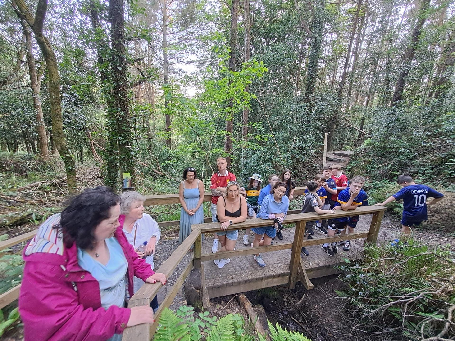 people walk in woods
