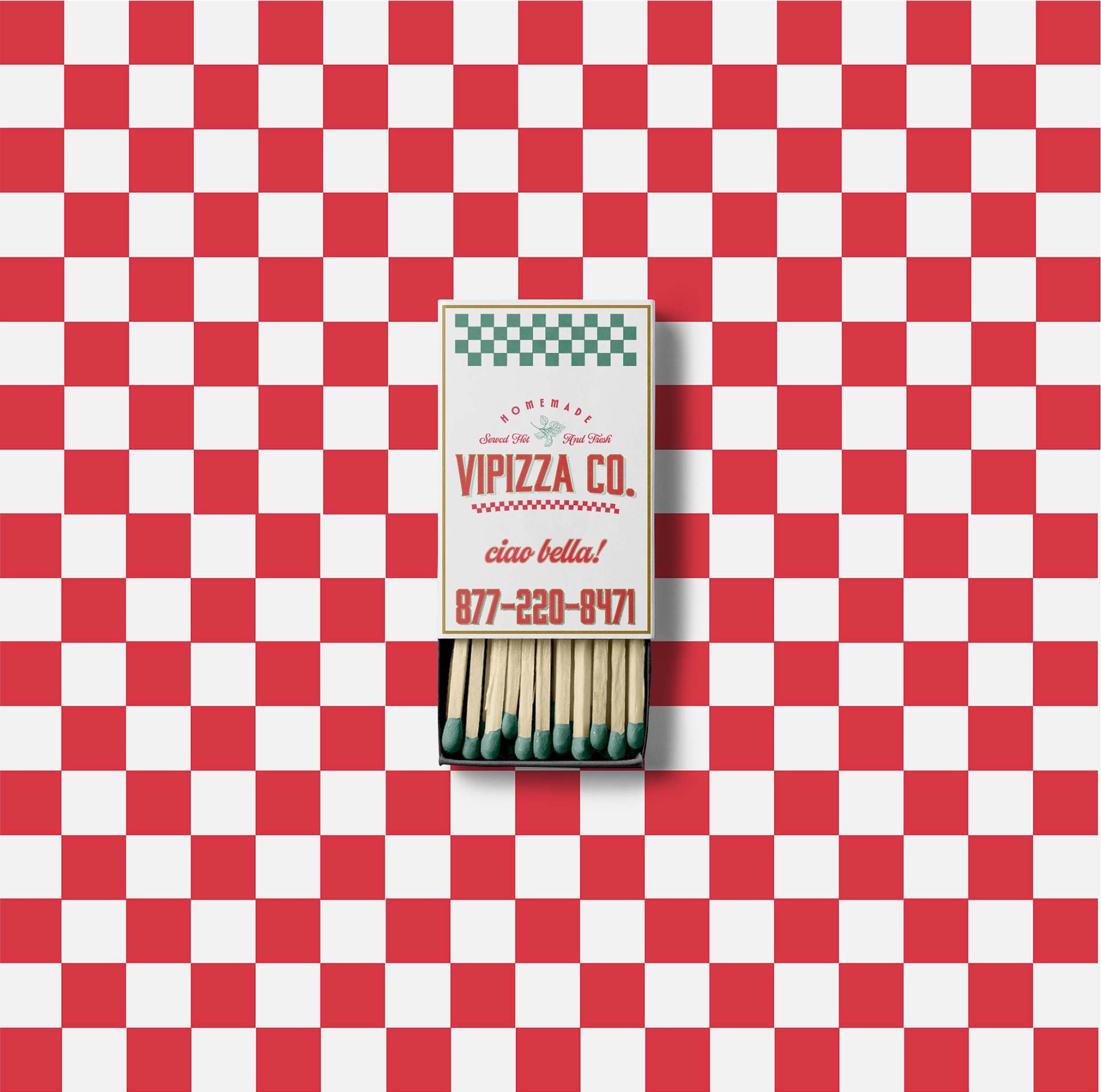 a box of matches on a checkered surface