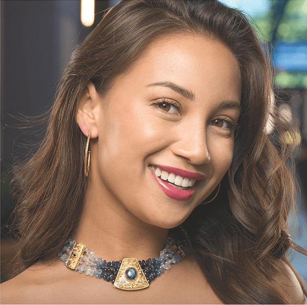 Smiling woman wearing a necklace