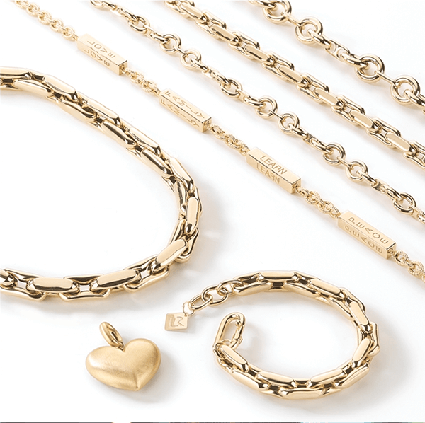 Golden bracelets with a heart charm