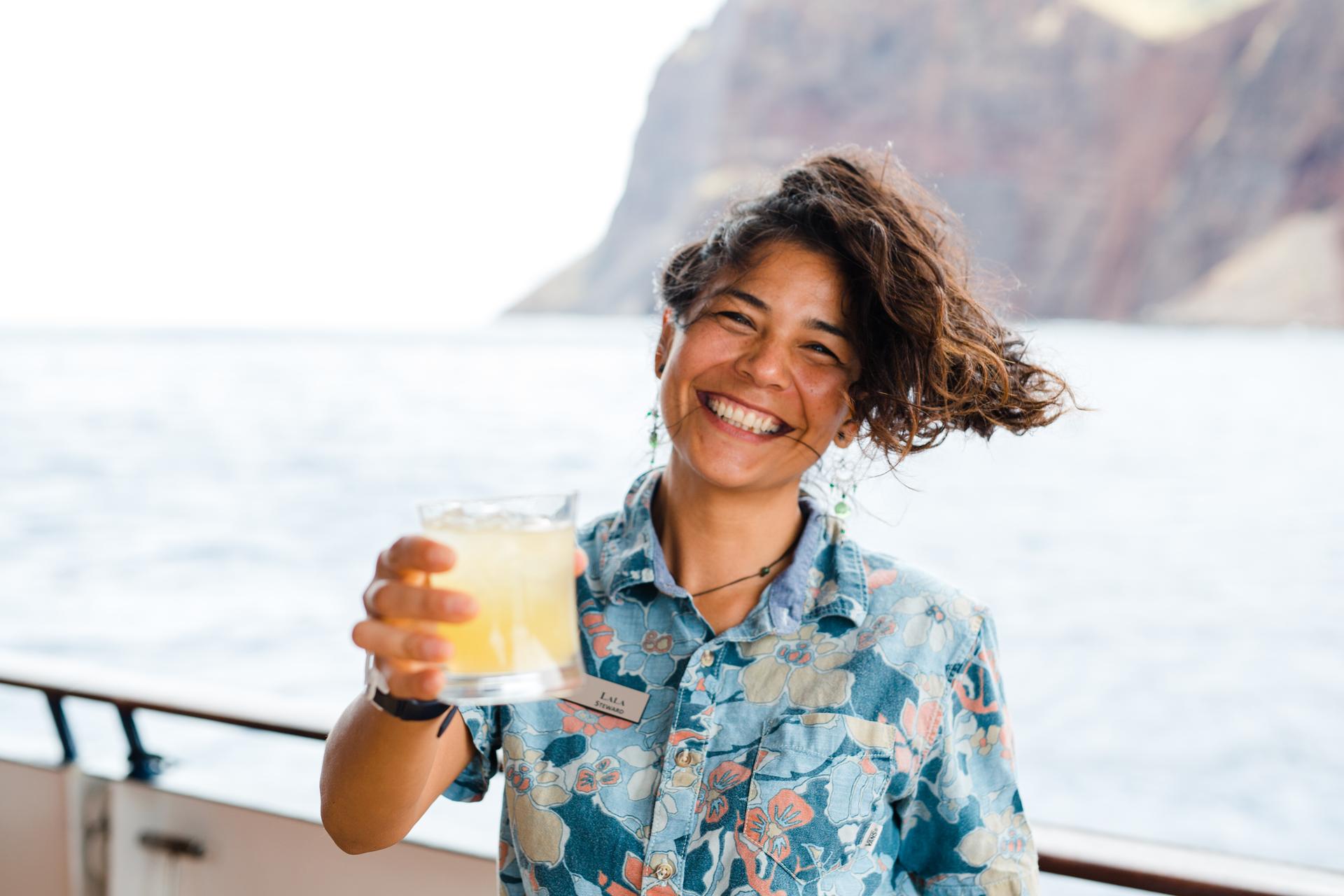 UnCruise bartender with delicious beverage