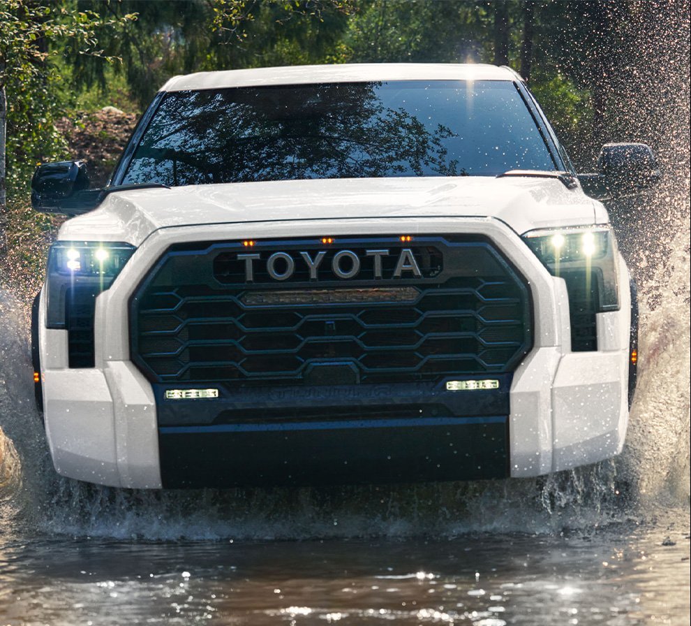 The New 2026 Toyota Tundra at CMA's Toyota of Martinsburg in Martinsburg, WV | Close up of the front of a 2026 Toyota Tundra driving through some water