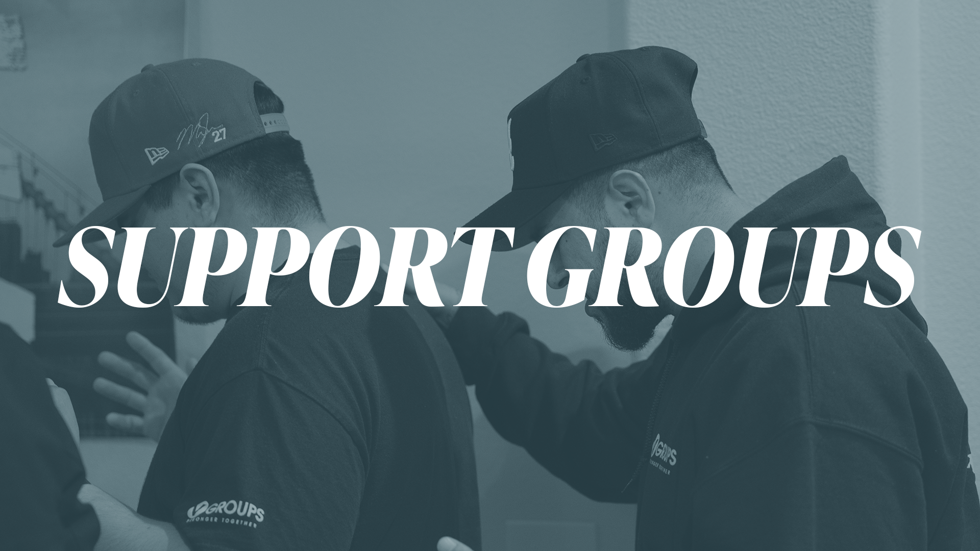 two chairs on a dock overlooking a lake