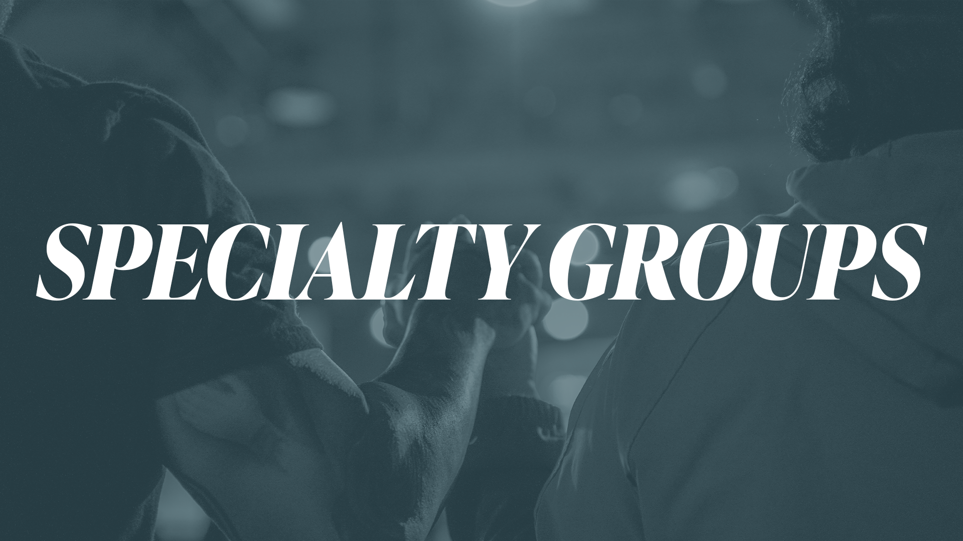 a man and woman cooking in a kitchen