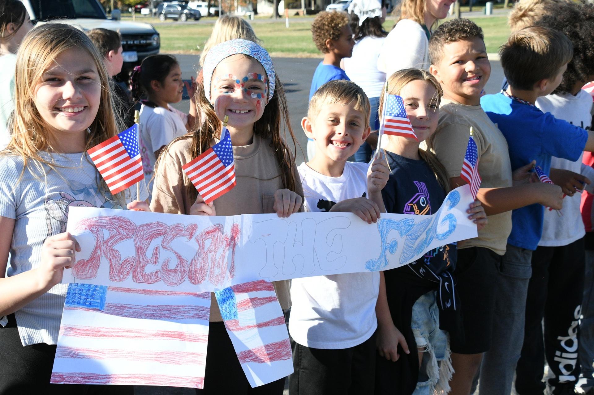 Picture of Veterans Day School Celebrations - students in a parade
