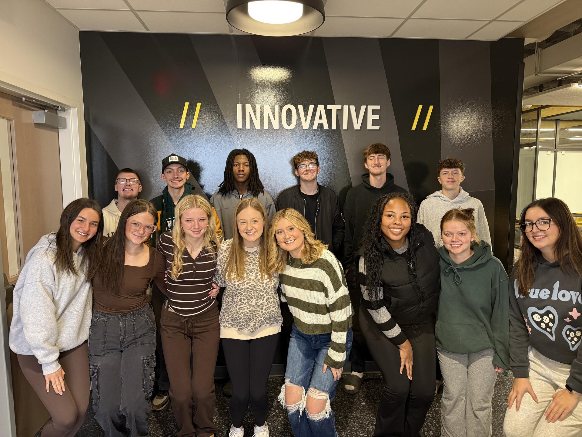 Picture of LIFT Leadership alumni lunch - students & alum posing