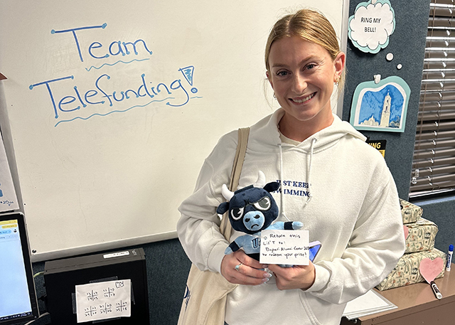 Student with Lil Torero on Torero Tuesday