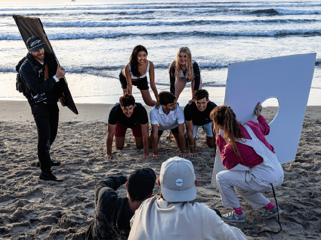 USD Students on the beach during an NIL partnership with Nautica.