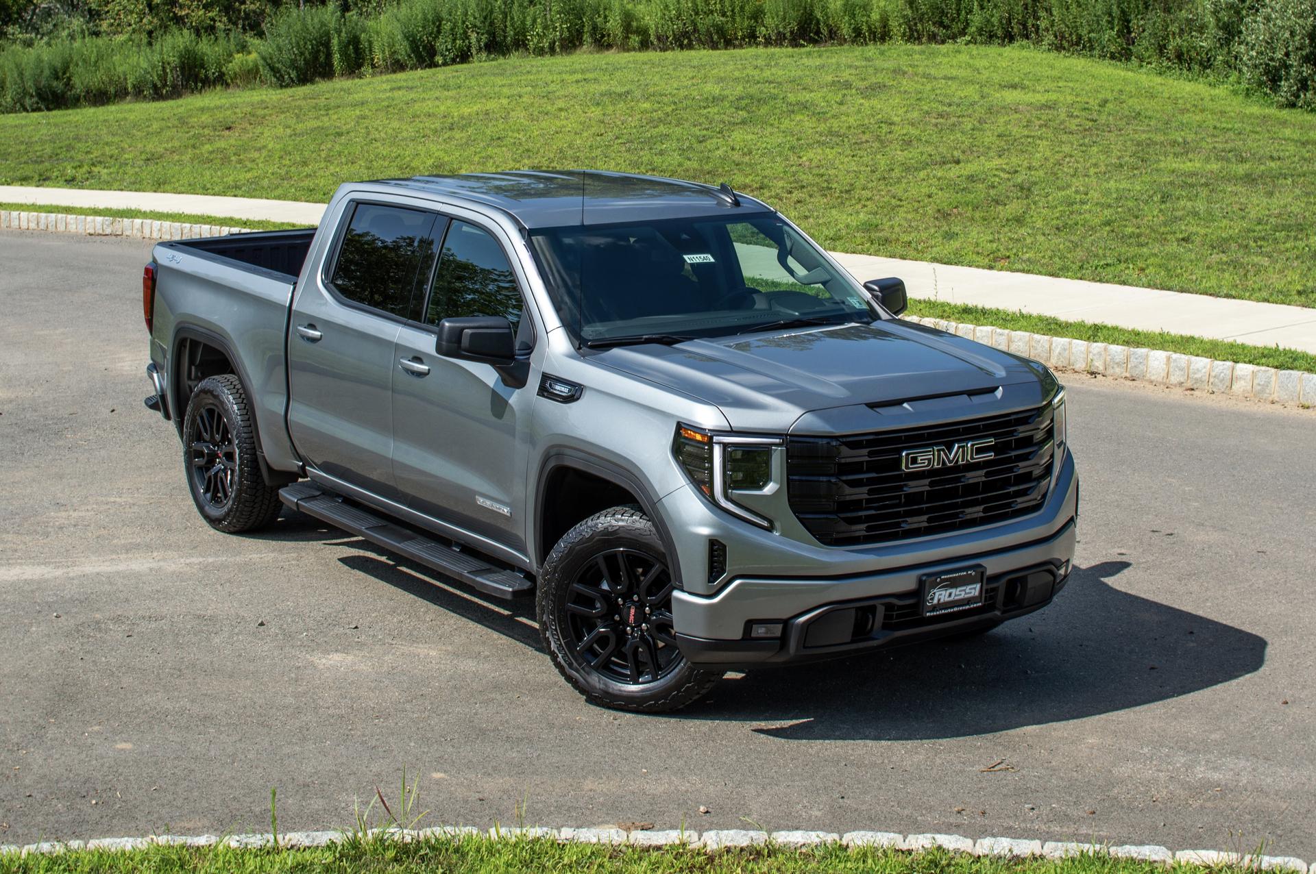 2026 GMC Sierra 1500 exterior showing bold front grille and LED lighting near Hackettstown NJ