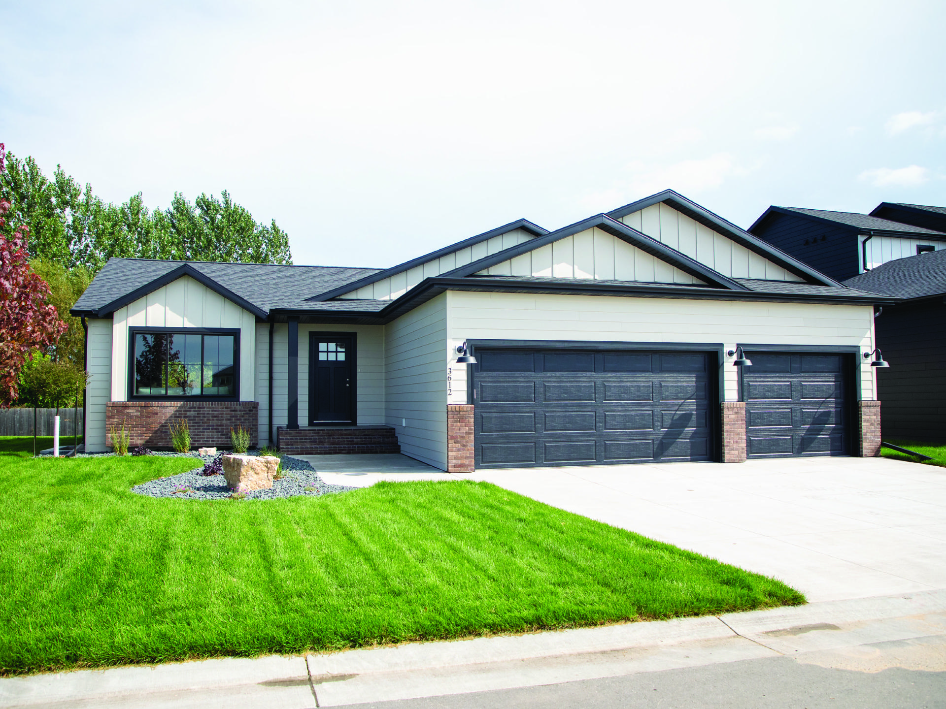a woman leaning against a wall