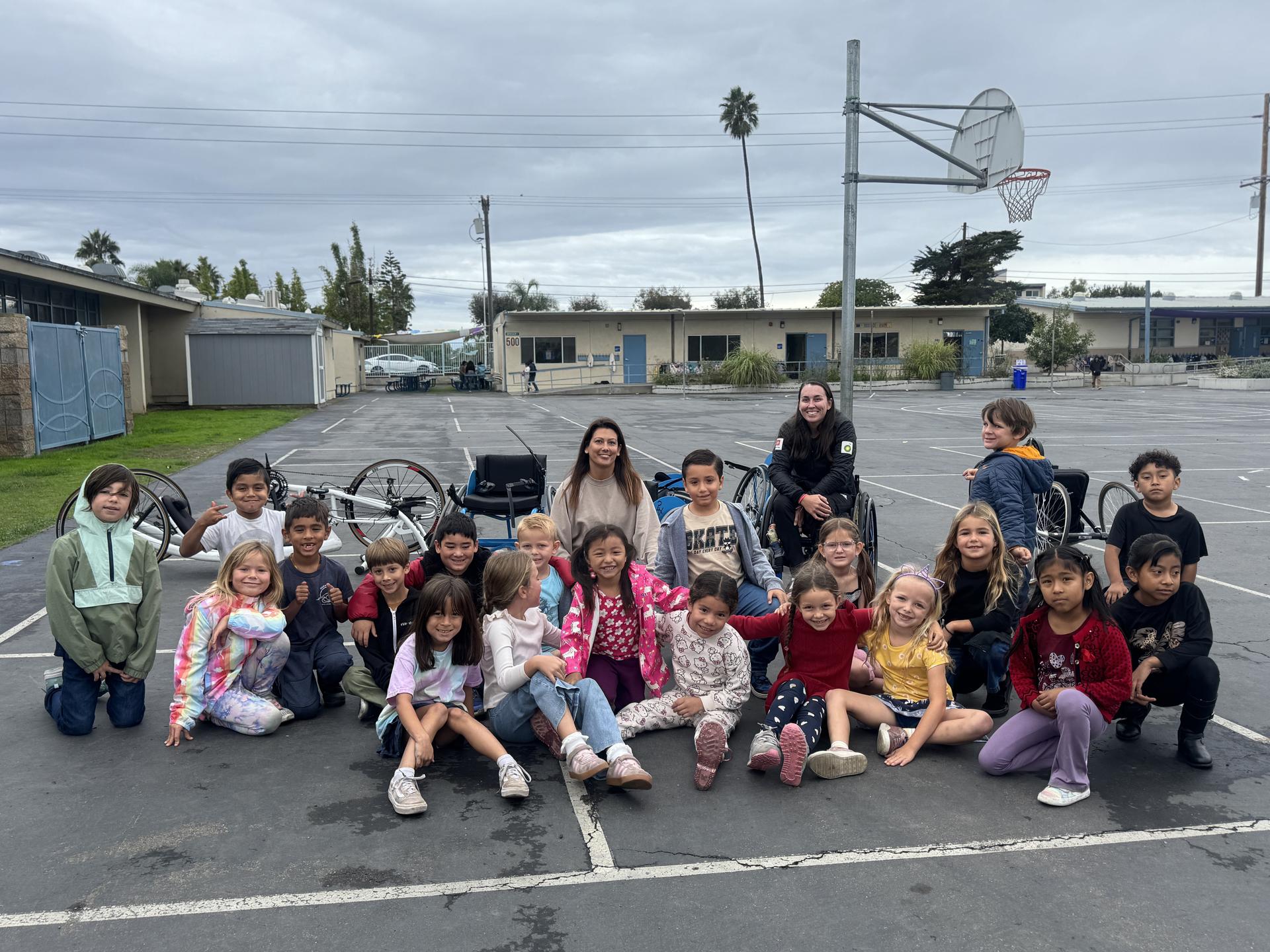 Ocean Knoll class learns about wheelchairs and handcycling from Ryen Reed. 
