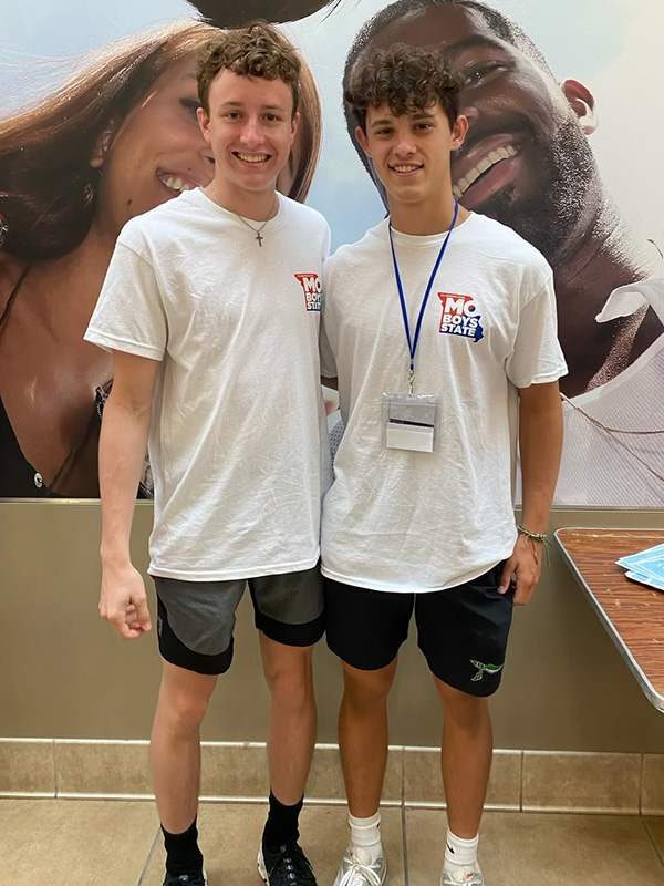 Creed Carlson standing next to another Boys State attendee.