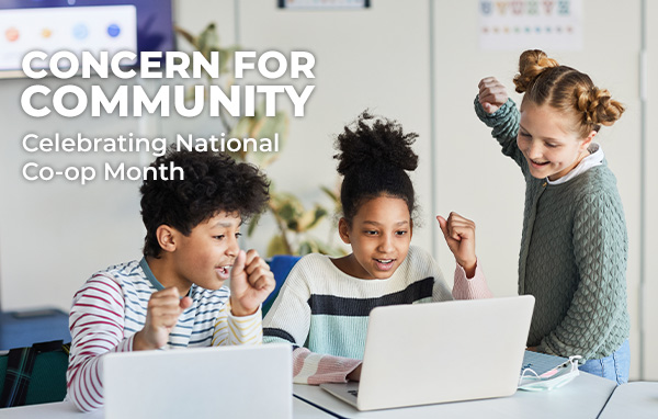 Concern for Community; Celebrating National Co-op Month; Image: Three excited students looking at laptops.