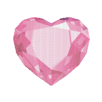 A spinning, faceted plastic pink jewel heart. Doesn't look anything like a real heart, but it's shiny.