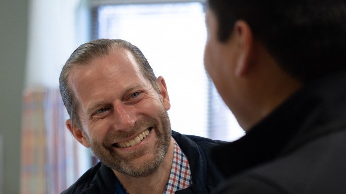 Rob Neel, MD, professor of neurology and director of the ALS clinic with patient