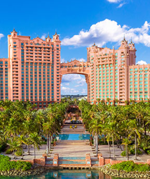 a pool with a deck chair and umbrella