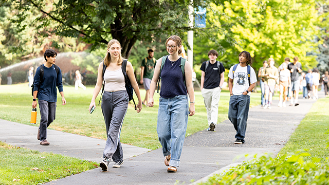 Students walking across campus.