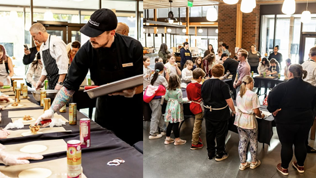 Bon  Appétit staff interact with and serve food to a large group of children.