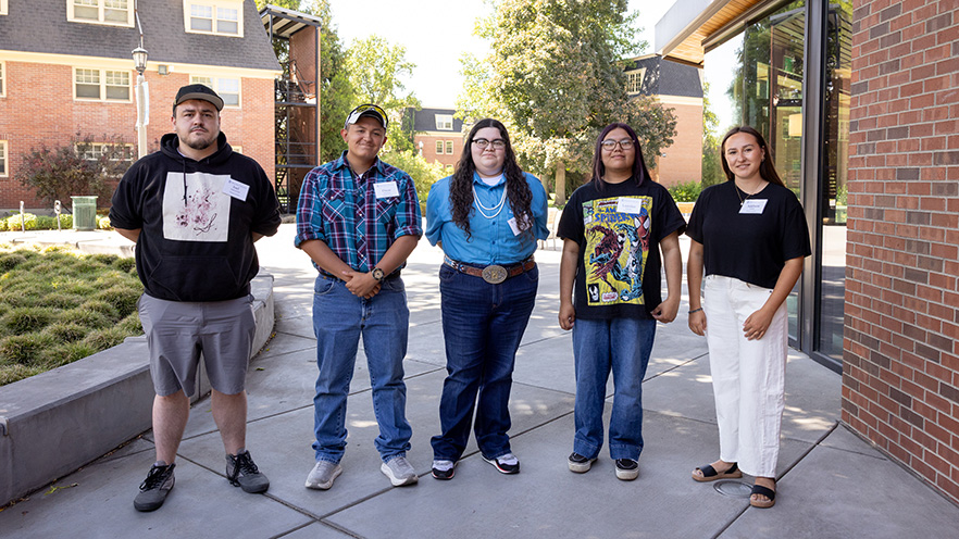 Joel Satterwhite ’29, Oscar Huesties ’29, Addison Jones-Kosey ’29, Lauralee Stanger ’29 and Addison Carey ’29 stand together outside Cleveland Commons.