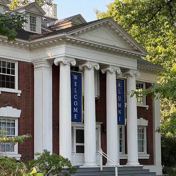 The front entrance of Baker Center strung with “Welcome Alumni” banners.