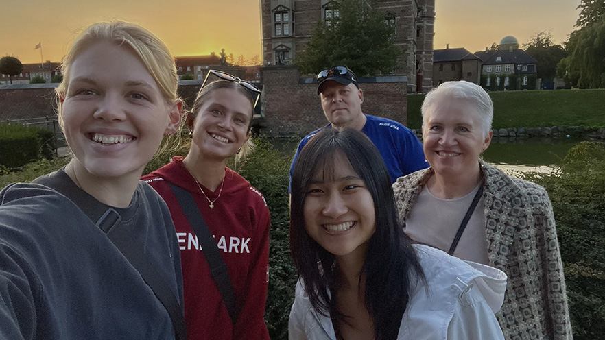MinhThu Tran poses for a selfie with a host family.