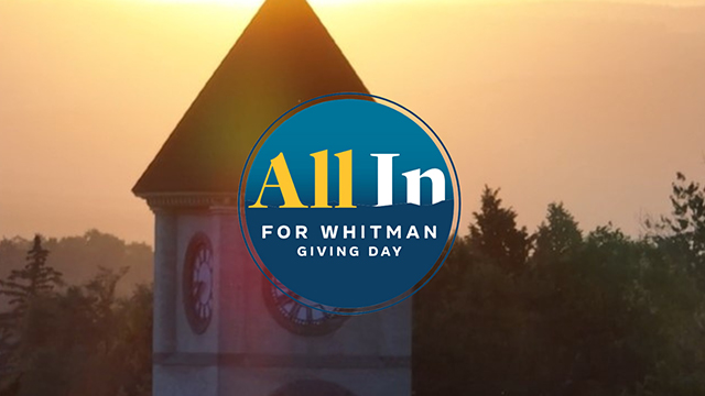 Blue, yellow and white “All In for Whitman Giving Day” logo overlaid on top of a sunset photo of the Memorial Building clock tower.