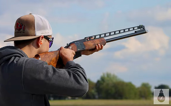 Youth at the Gilbert Shooting Club shooting a target.