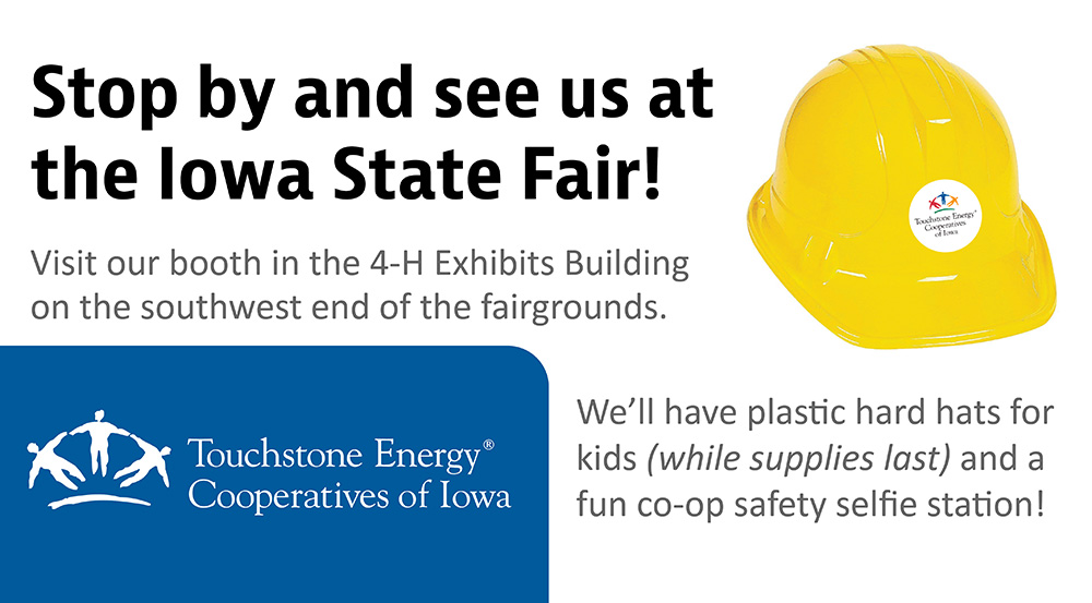 Stop by and see us at the Iowa State Fair! Image: Yellow plastic hard hat.