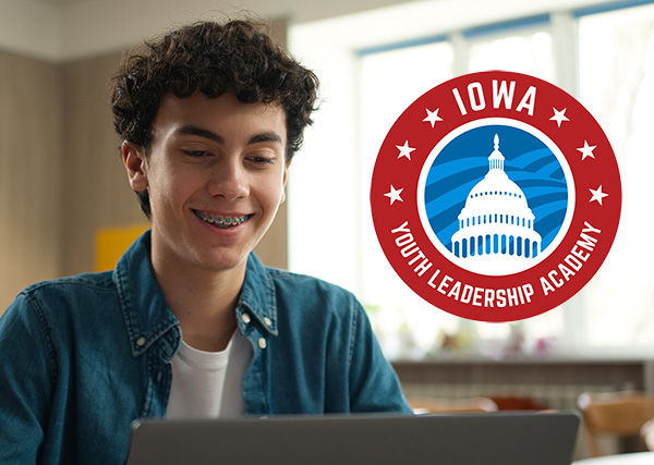 Iowa Youth Leadership logo and smiling teen on laptop.