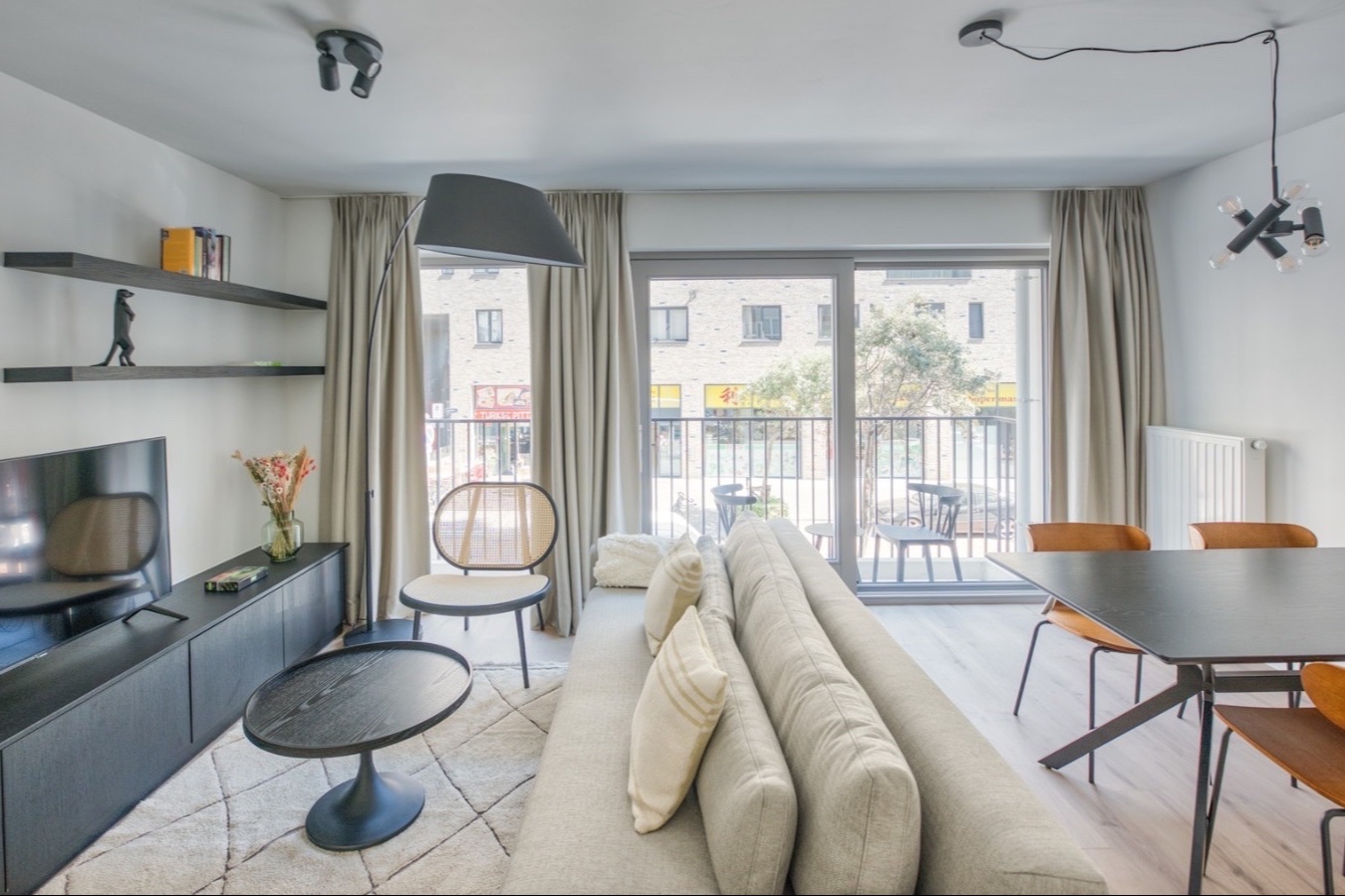 Woonkamer van het appartement in Residentie De Tijd